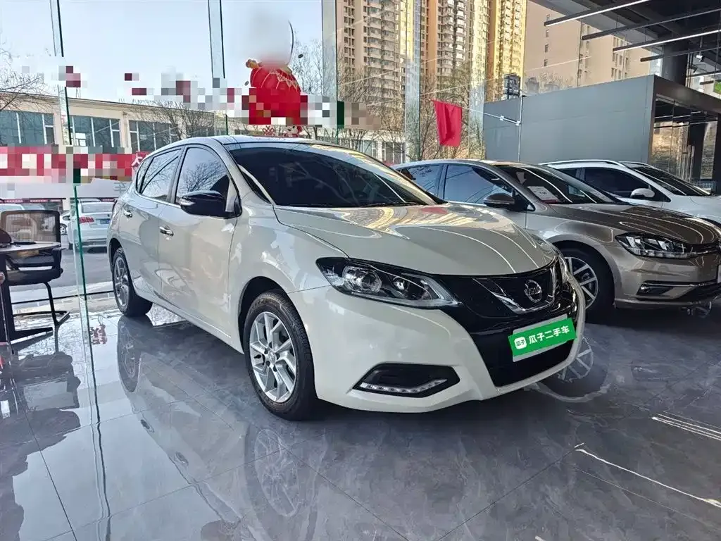 Nissan Tiida — фото 4