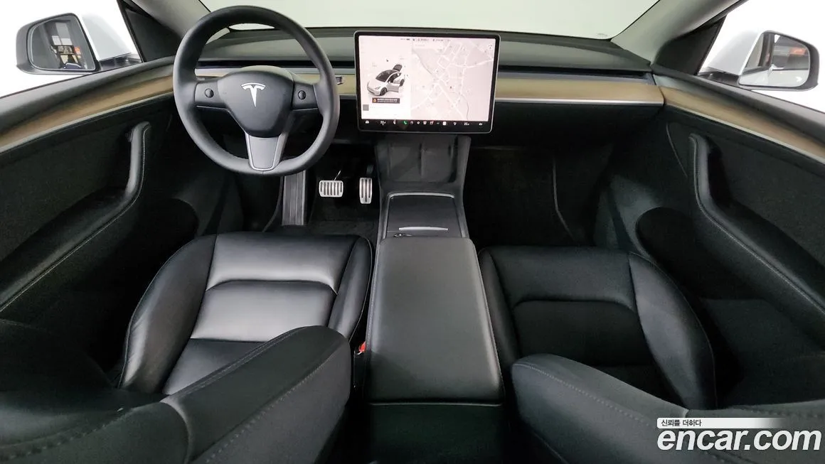 Tesla Model Y — фото 7