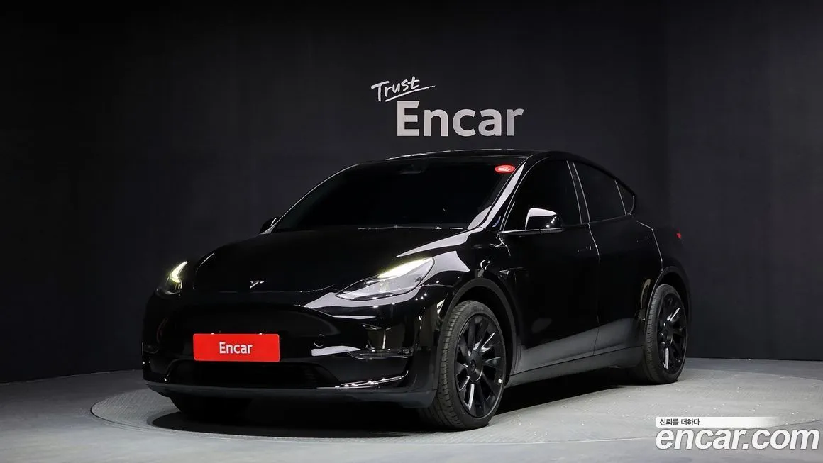 Tesla Model Y — фото 1