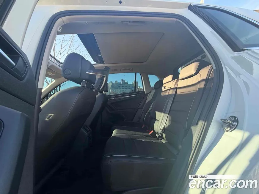 Volkswagen Tiguan — фото 10