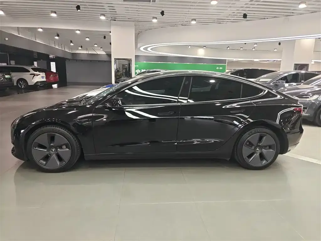 Tesla Model 3 — фото 5