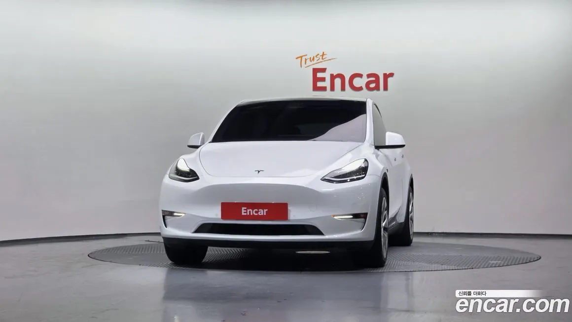 Tesla Model Y — фото 10