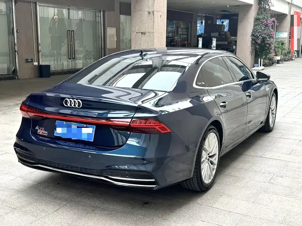 Audi A7L — фото 8