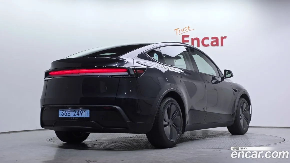 Tesla Model Y — фото 3