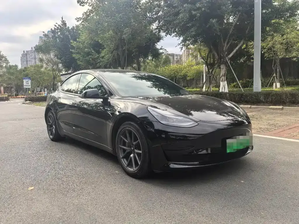 Tesla Model 3 — фото 7