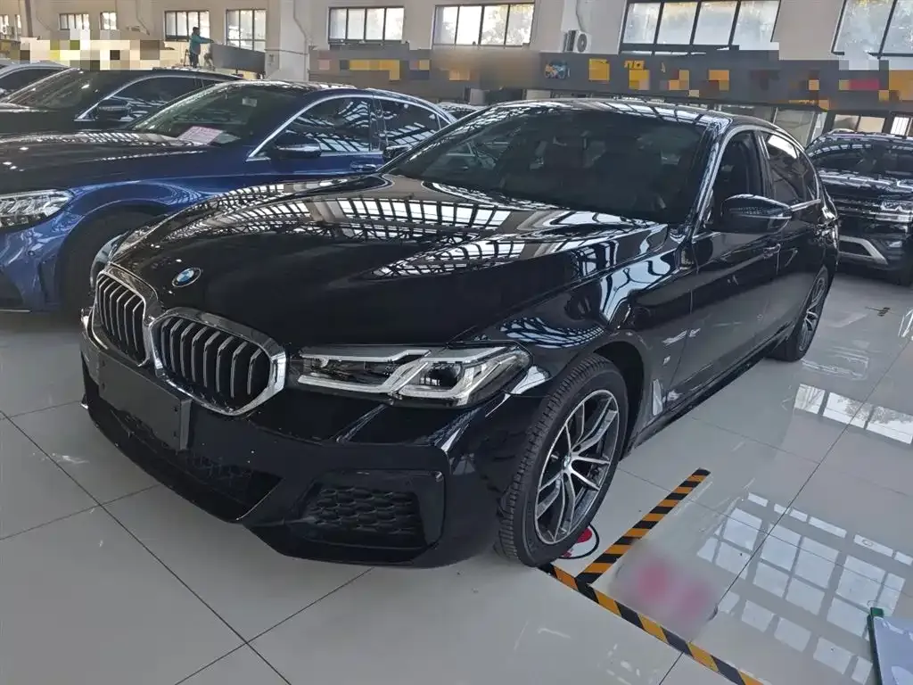 BMW 5 Series — фото 1
