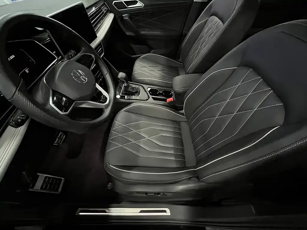 Volkswagen Tiguan L — фото 3