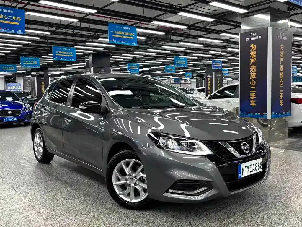 Nissan Tiida — фото 8