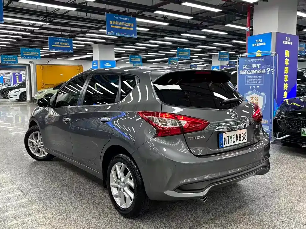 Nissan Tiida — фото 10