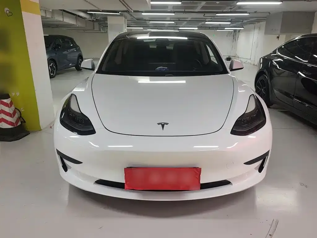 Tesla Model 3 — фото 7
