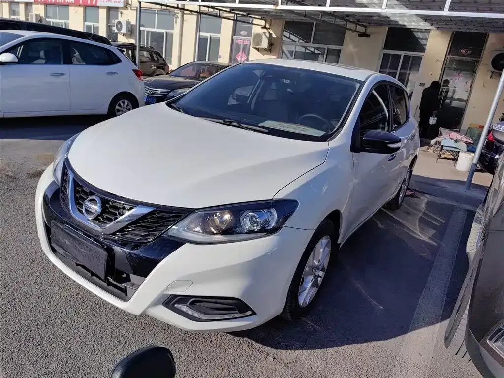 Nissan Tiida — фото 10