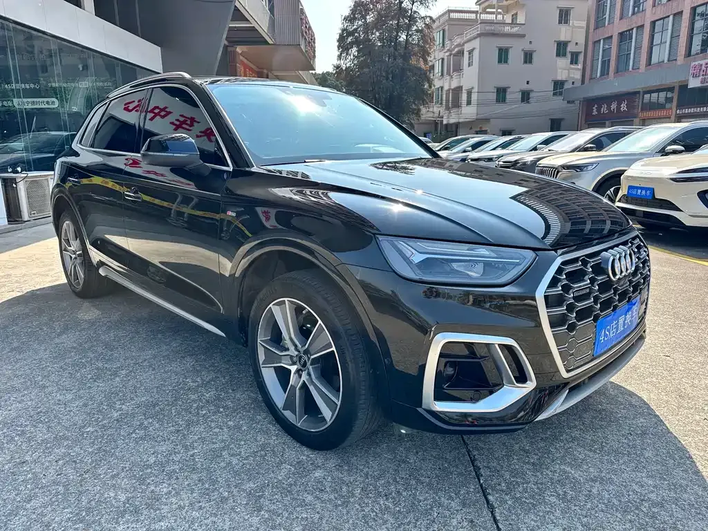 Audi Q5L — фото 8