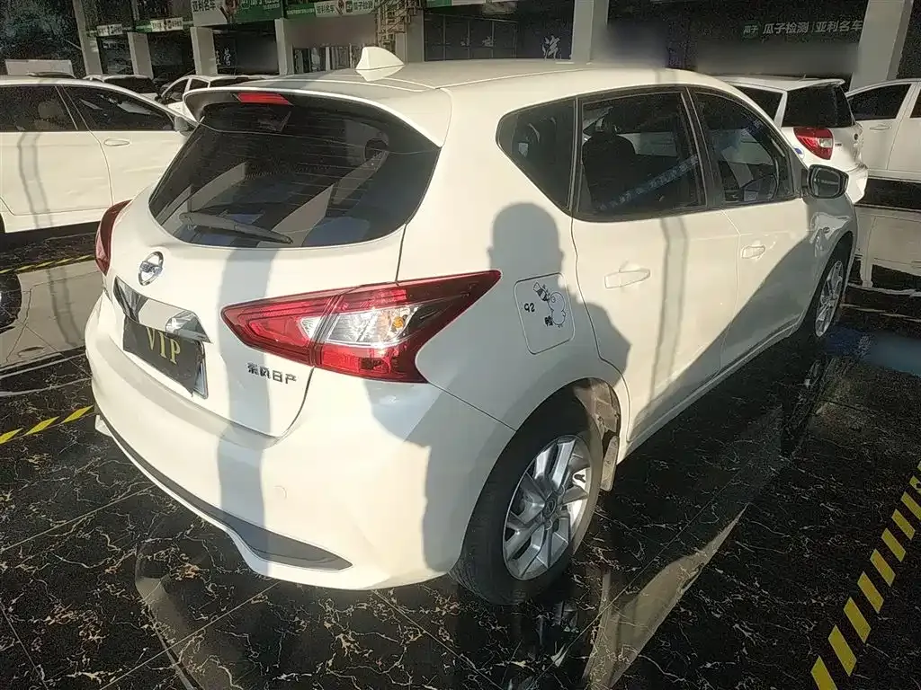Nissan Tiida — фото 10