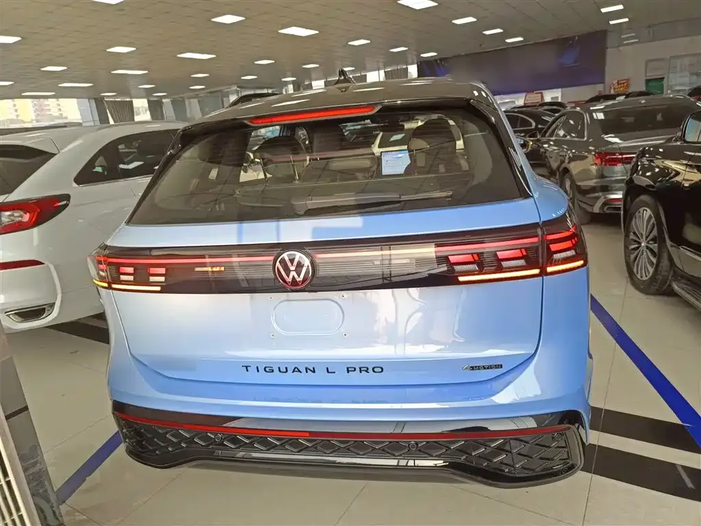 Volkswagen Tiguan L — фото 3