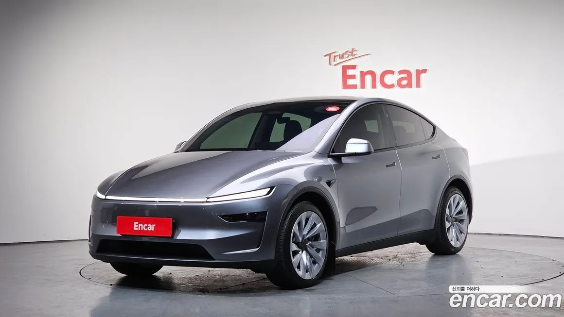 Tesla Model Y — фото 1
