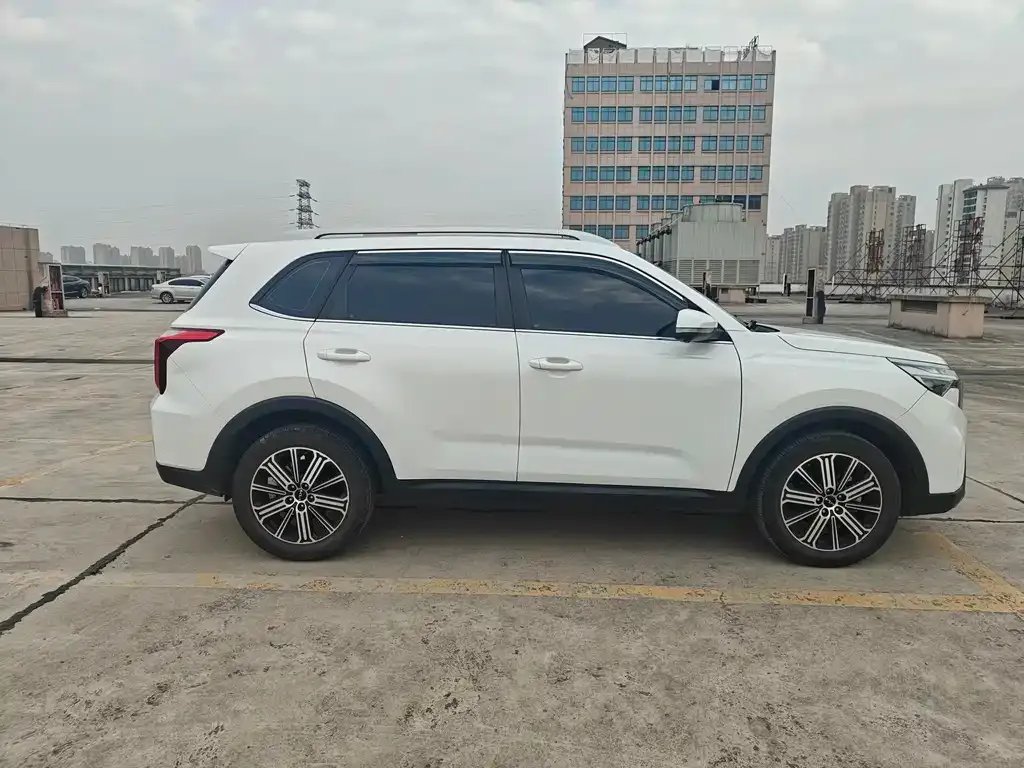 Kia Sportage — фото 7