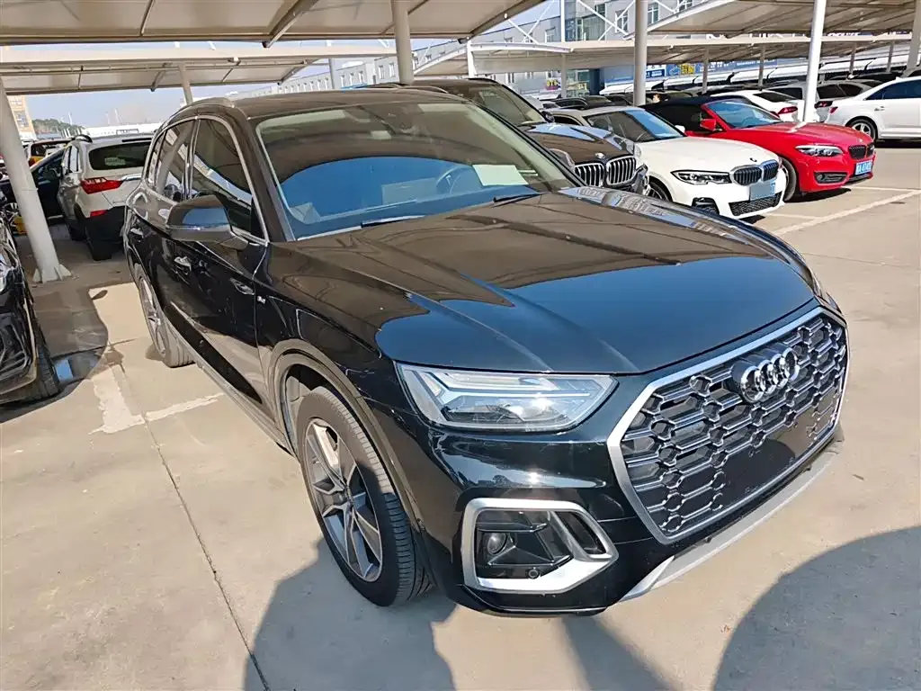 Audi Q5L — фото 7