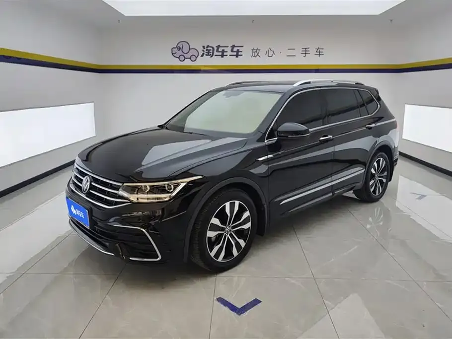 Volkswagen Tiguan L — фото 1