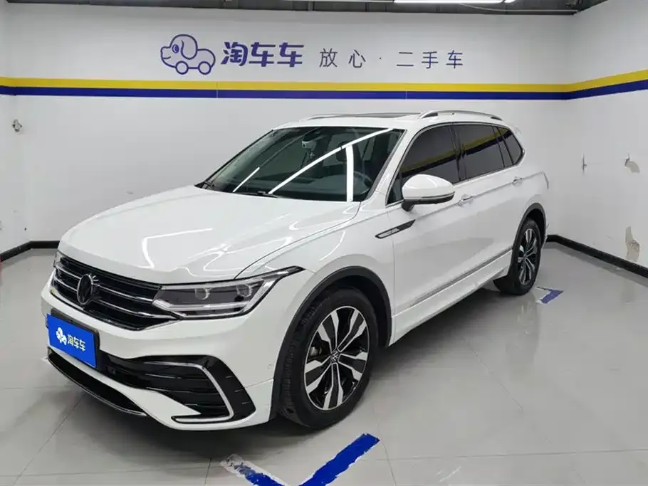 Volkswagen Tiguan L — фото 1