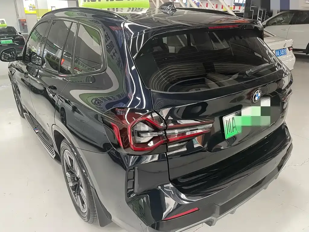 BMW iX3 — фото 10