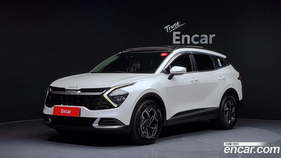 Kia Sportage — фото 1