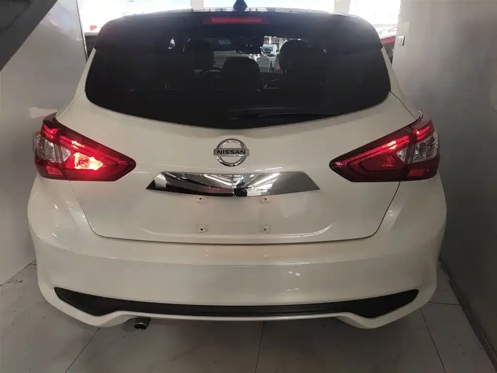 Nissan Tiida — фото 10