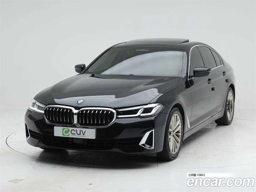 BMW 5-Series — фото 1