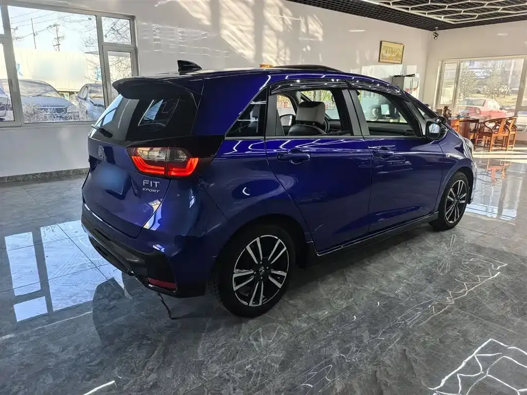 Honda Fit — фото 10