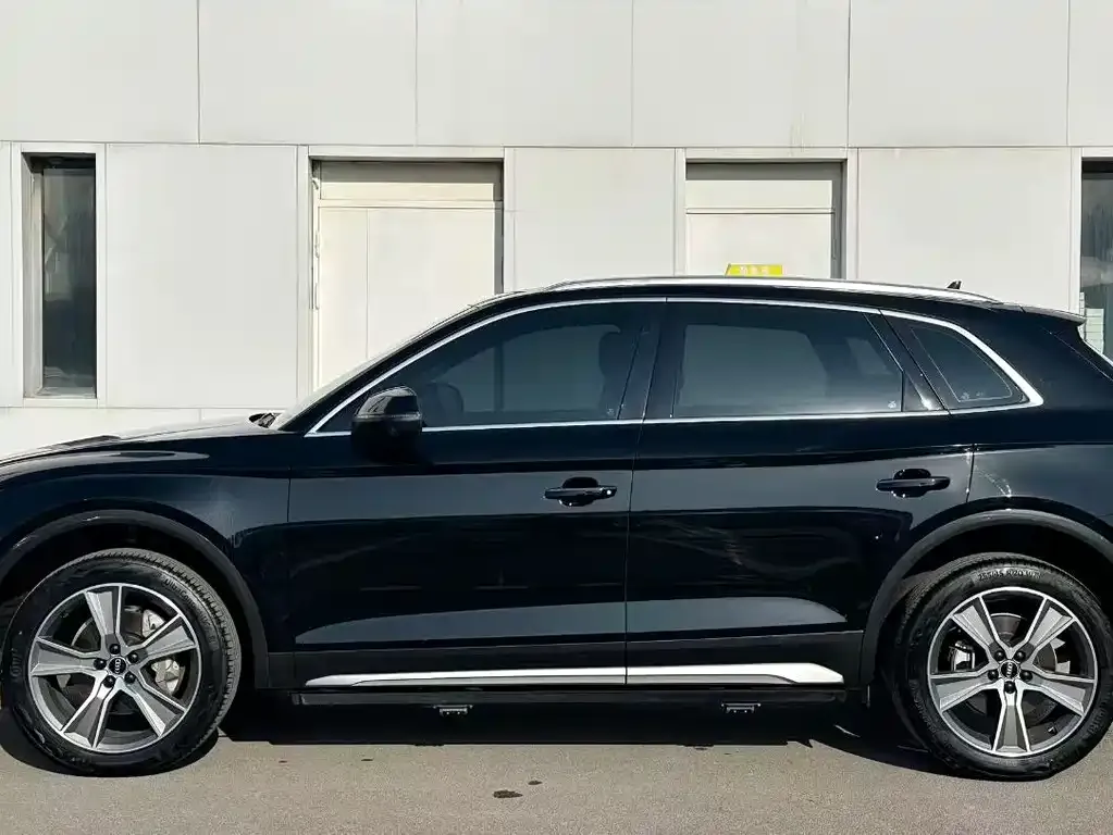 Audi Q5L — фото 9