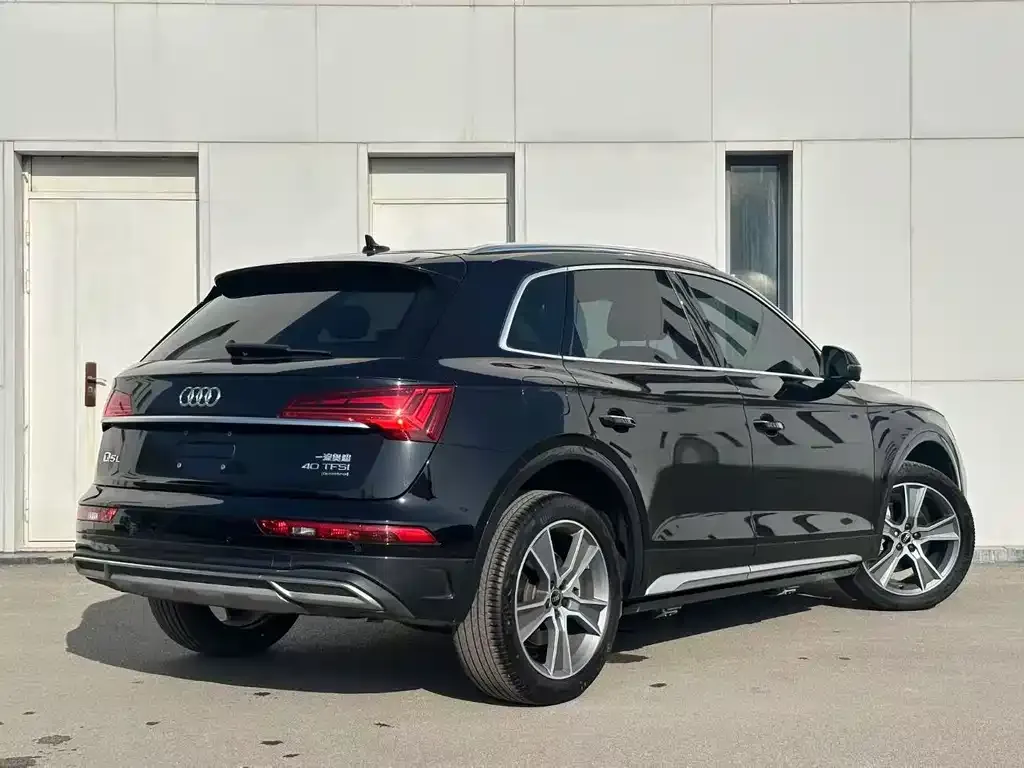 Audi Q5L — фото 6