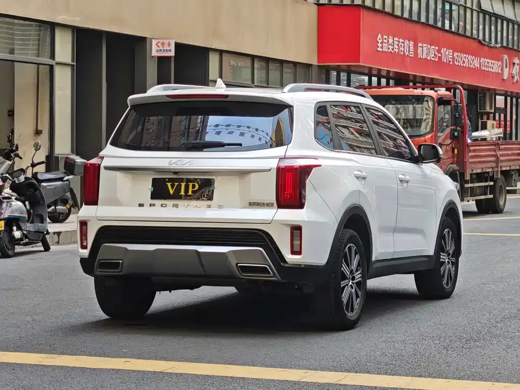 Kia Sportage — фото 9