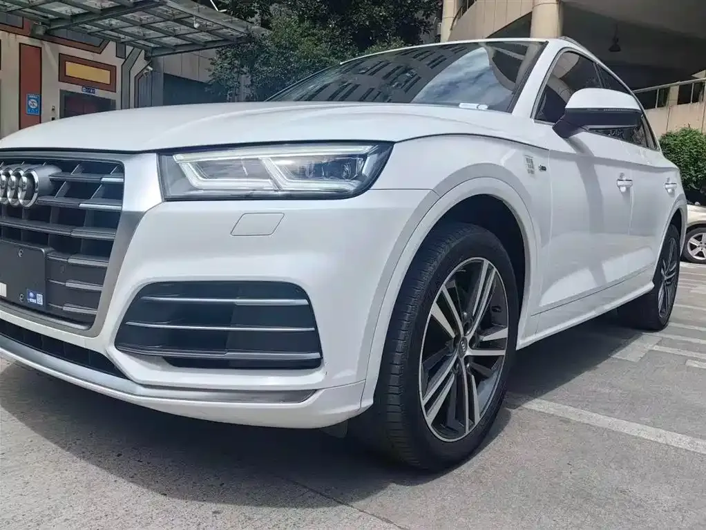 Audi Q5L — фото 9