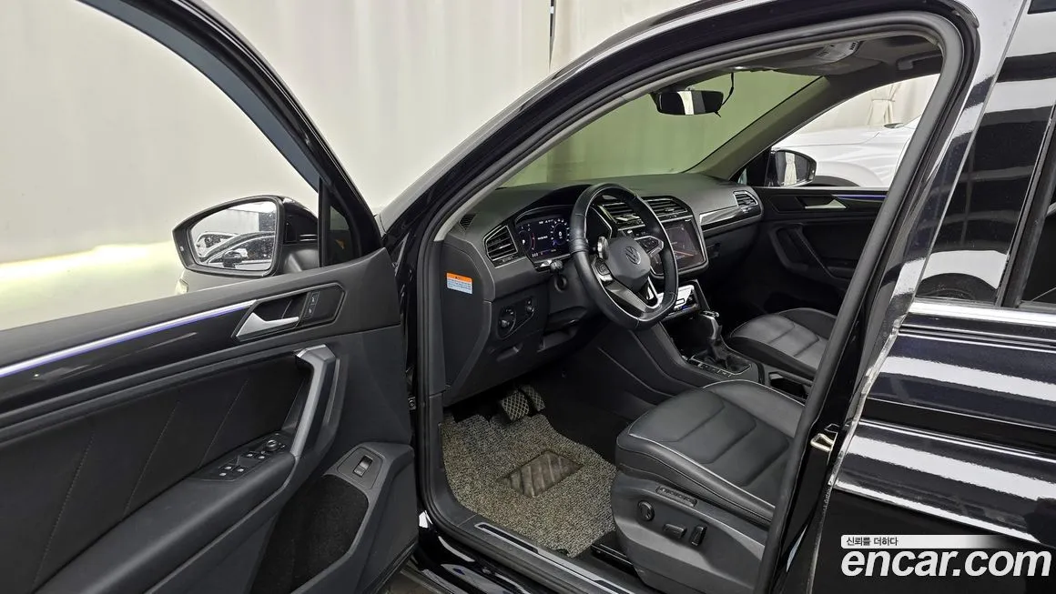 Volkswagen Tiguan — фото 10