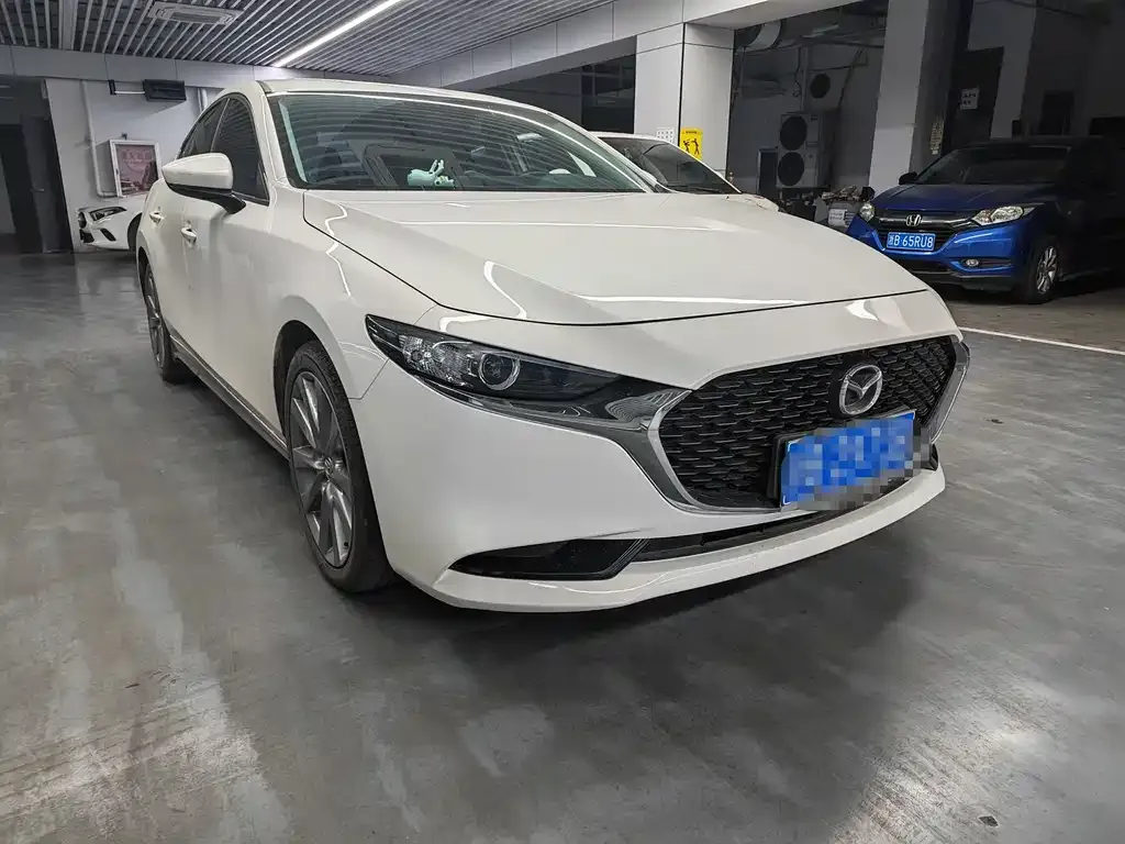 Mazda 3 Axela — фото 4