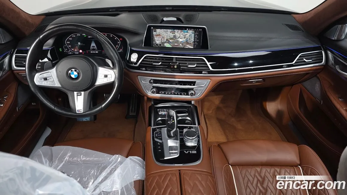 BMW 7-Series — фото 10
