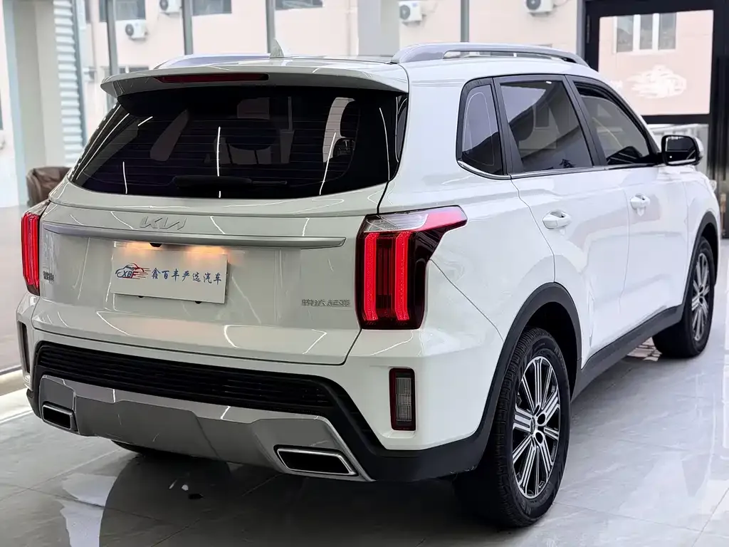 Kia Sportage — фото 10