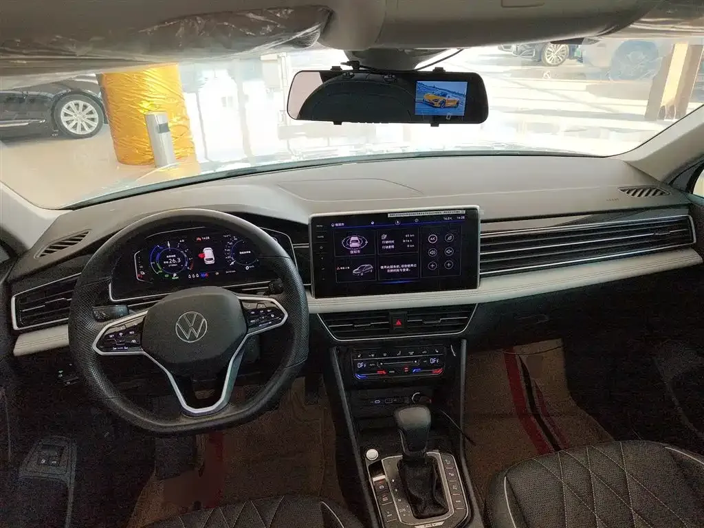 Volkswagen Tiguan L New Energy — фото 7