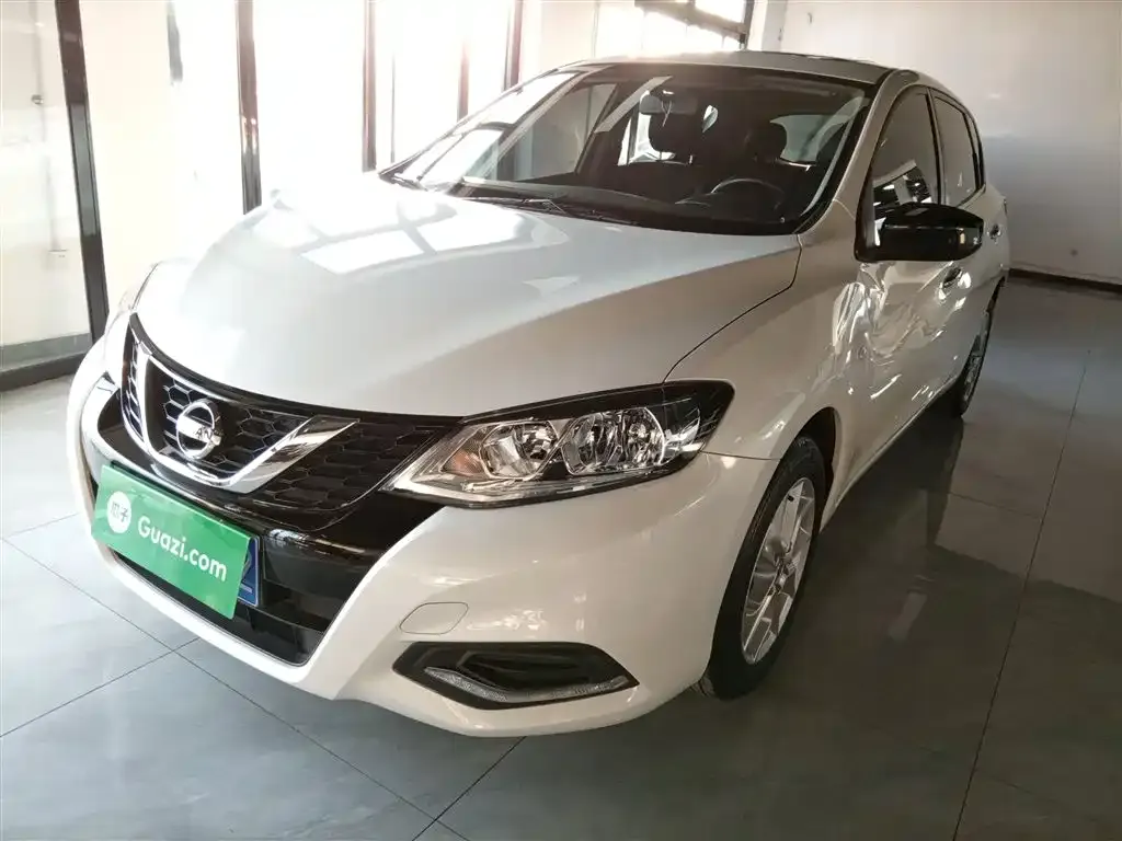 Nissan Tiida — фото 9