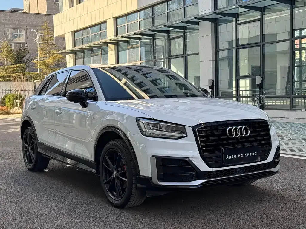 Audi Q2L — фото 8