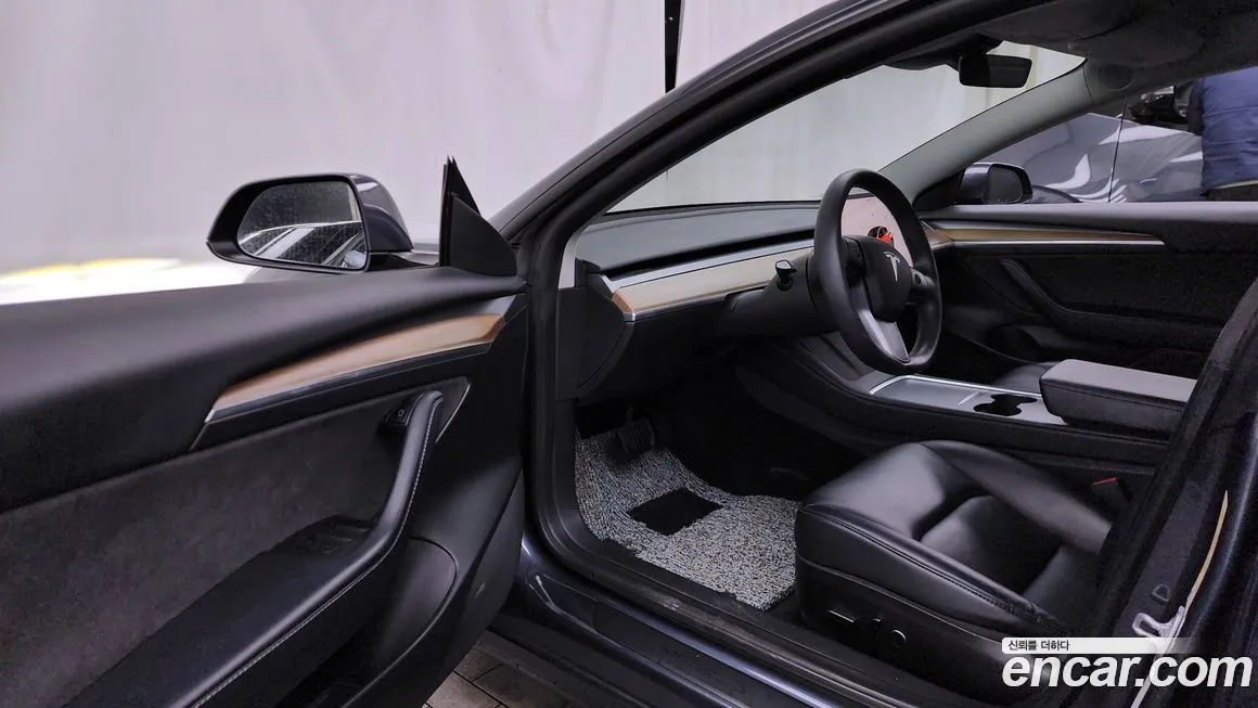Tesla Model 3 — фото 10