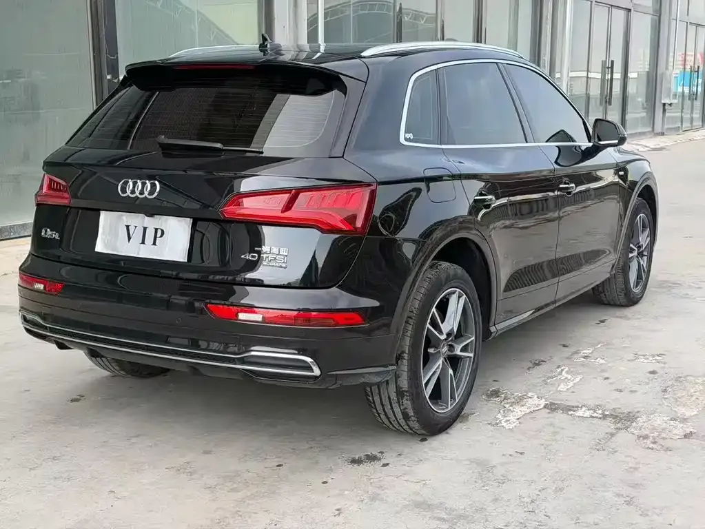 Audi Q5L — фото 7