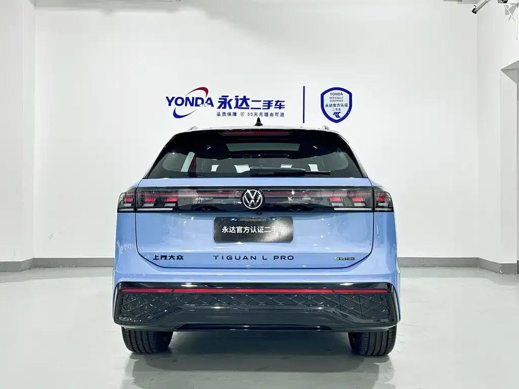 Volkswagen Tiguan L — фото 2