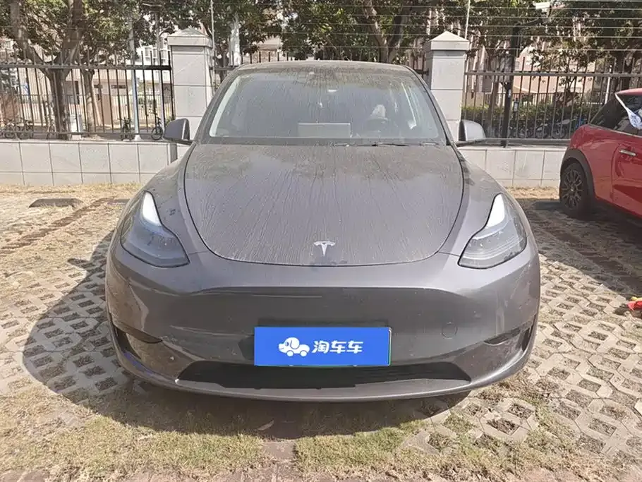Tesla Model Y — фото 10