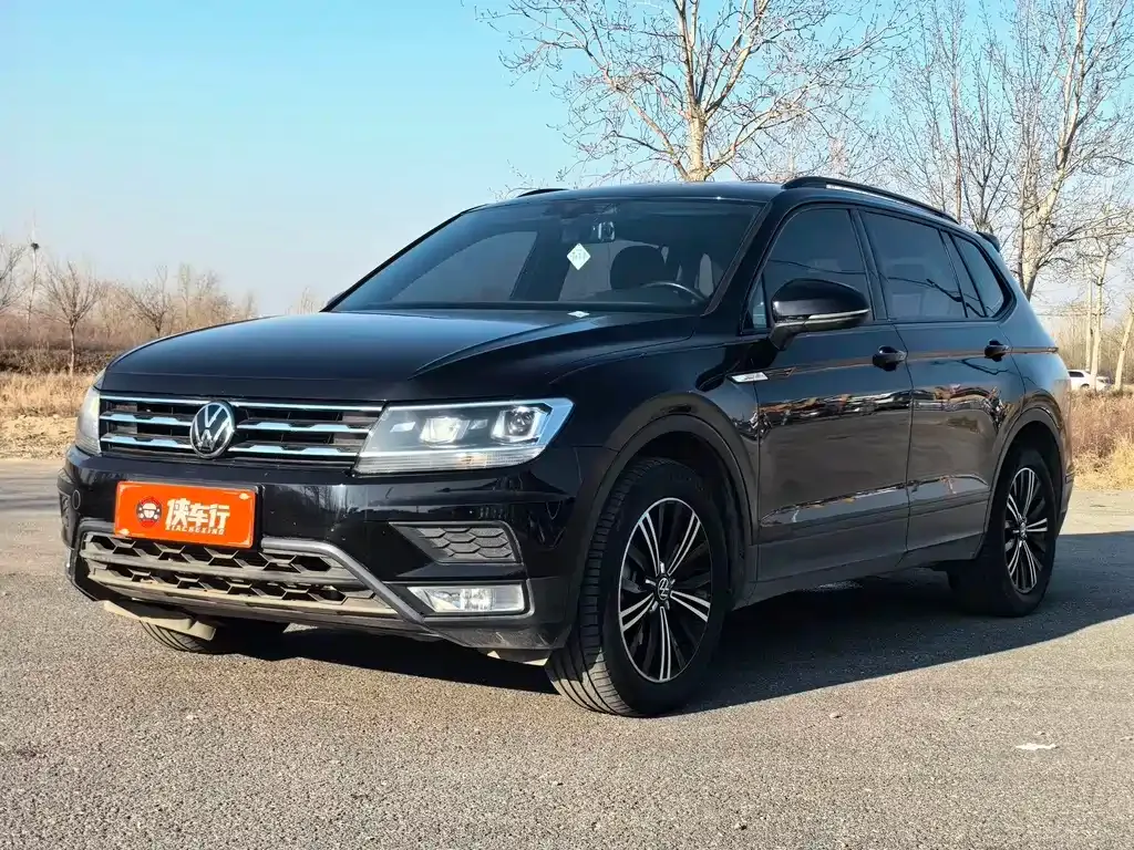 Volkswagen Tiguan L — фото 1