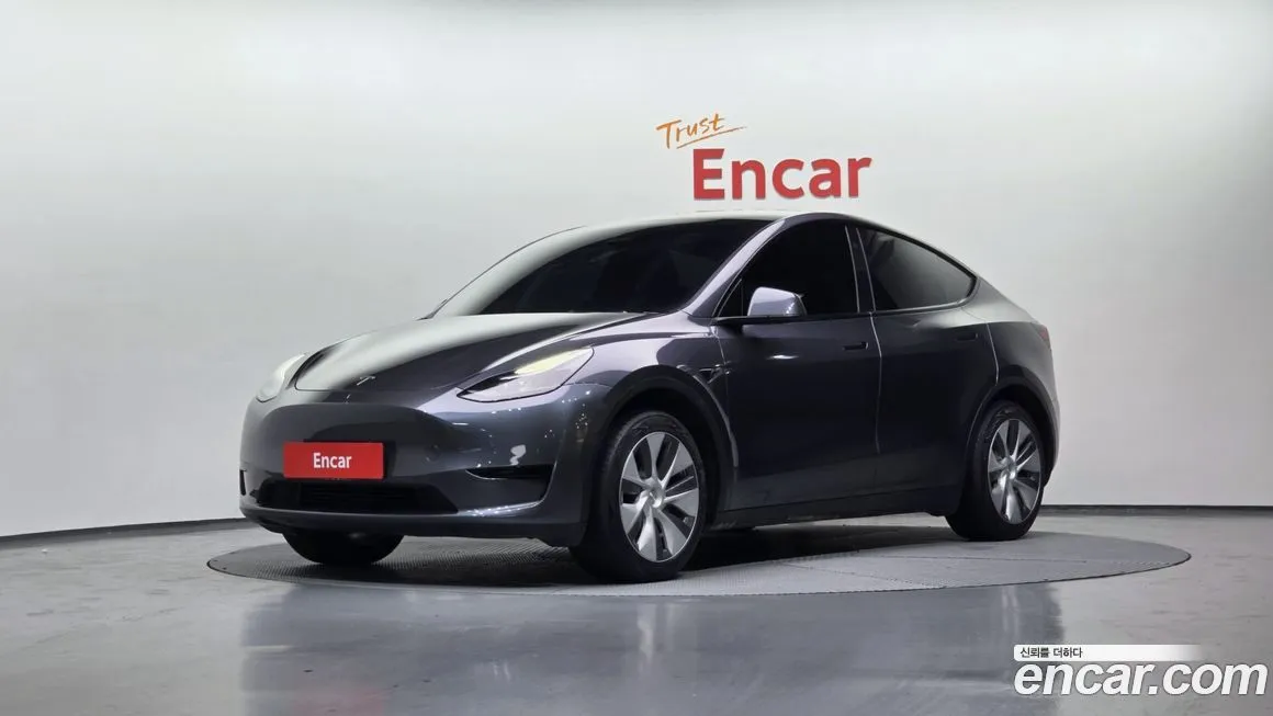 Tesla Model Y — фото 1