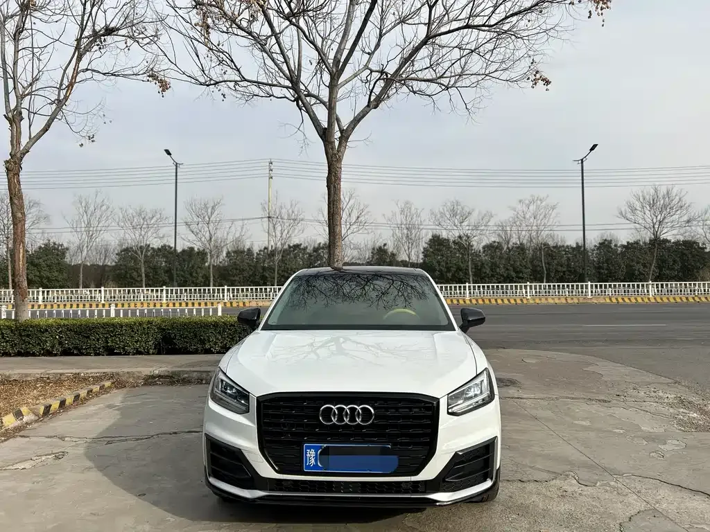 Audi Q2L — фото 7