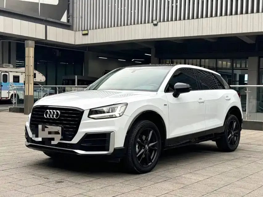 Audi Q2L — фото 10