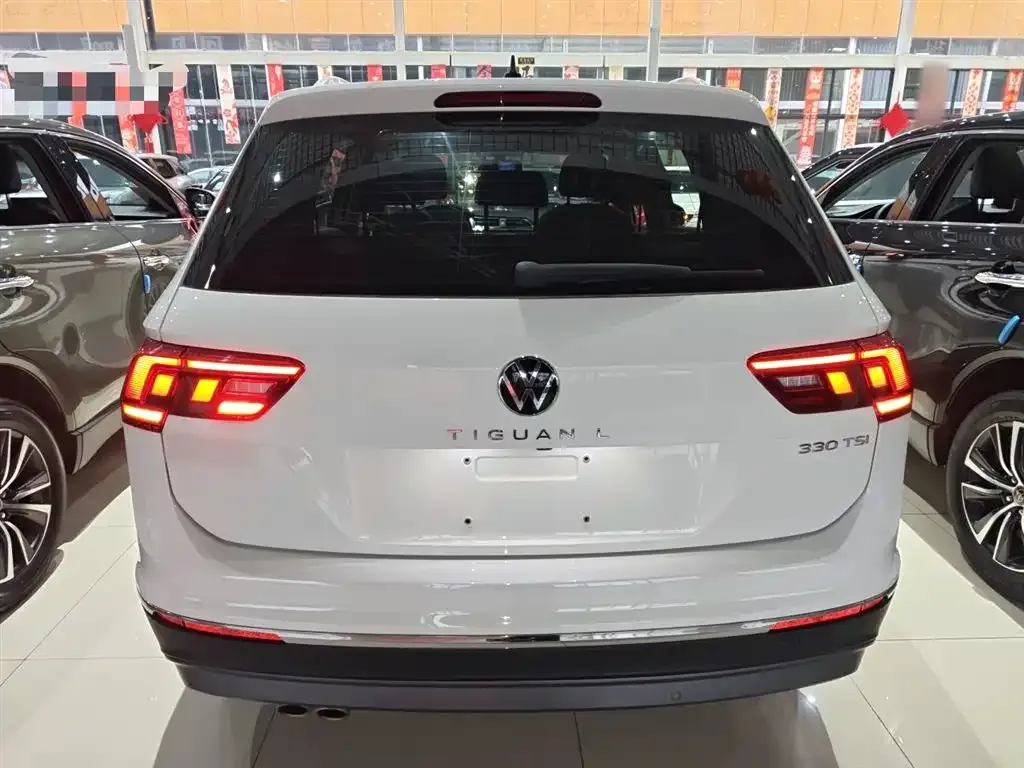 Volkswagen Tiguan L — фото 3