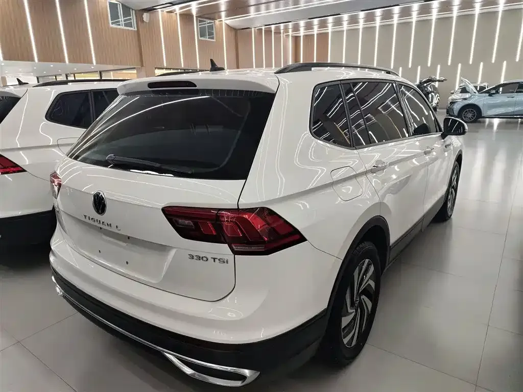 Volkswagen Tiguan L — фото 7