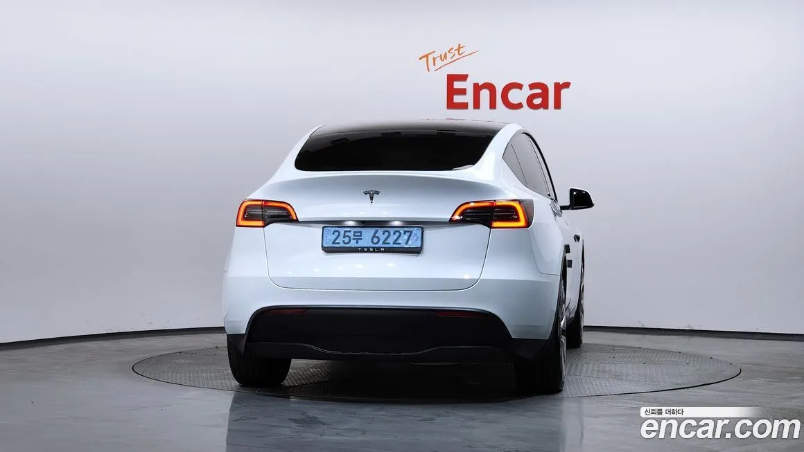 Tesla Model Y — фото 7